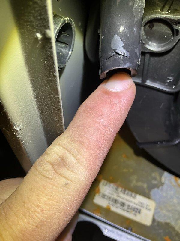 Responded to customer complaint of furnace leakage. Upon inspection, discovered a crack in the condensate drain assembly. Documented damage with photos and identified the damaged component as the source of the water leak.