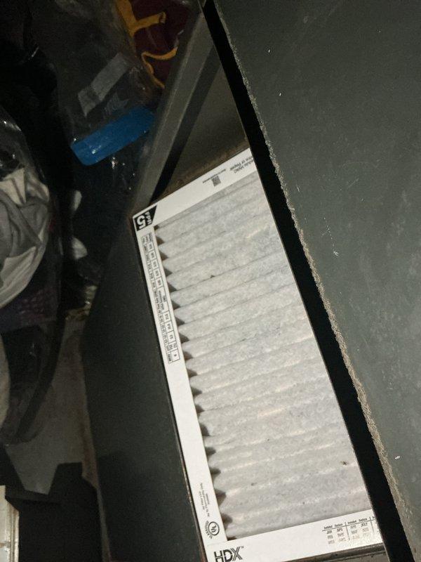 Performed routine heating maintenance on Goodman furnace system. Inspected and noted existing HDX air filter showing normal dust accumulation. Checked all PVC venting connections, shut-off valves, and exhaust flue for proper operation and integrity.