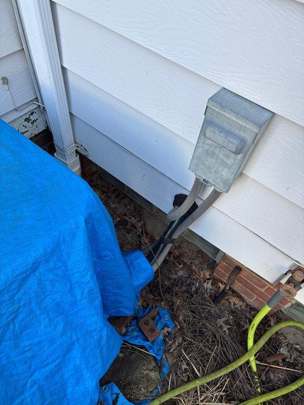 Conducted comprehensive assessment of existing heat pump system and surrounding infrastructure. Inspected exterior electrical connections and junction box mounted on vinyl siding. Evaluated interior plumbing components, noting aging copper pipes with visible oxidation at joints and functional red valve handle. Presented replacement heat pump options to customer based on findings.