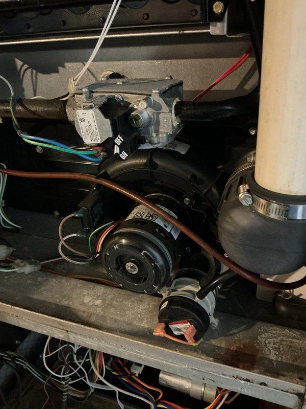 Conducted scheduled heating tune-up service on residential HVAC system. Inspected internal components including motor assembly, electrical connections, and ventilation system. Cleaned accumulated dust from interior components and verified proper operation of all mechanical and electrical systems.