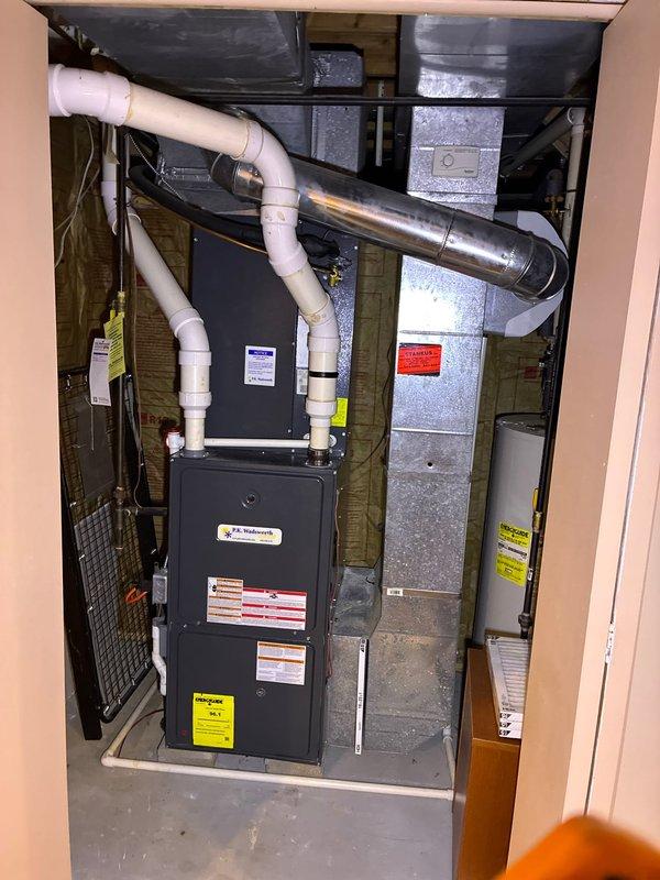 Conducted inspection of existing Goodman furnace system requiring repairs. Evaluated ductwork showing condensation issues and noted exposed fiberglass insulation in utility area. Presented replacement options with available MVP discount programs as requested by customer.