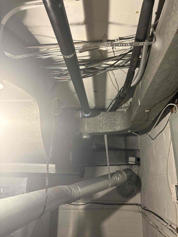 Successfully replaced approximately 5 feet of 2-inch steam piping and union above the boiler in the mechanical utility area. Pressure testing confirmed proper system operation with gauge reading at 7-8 PSI, within normal operating parameters.