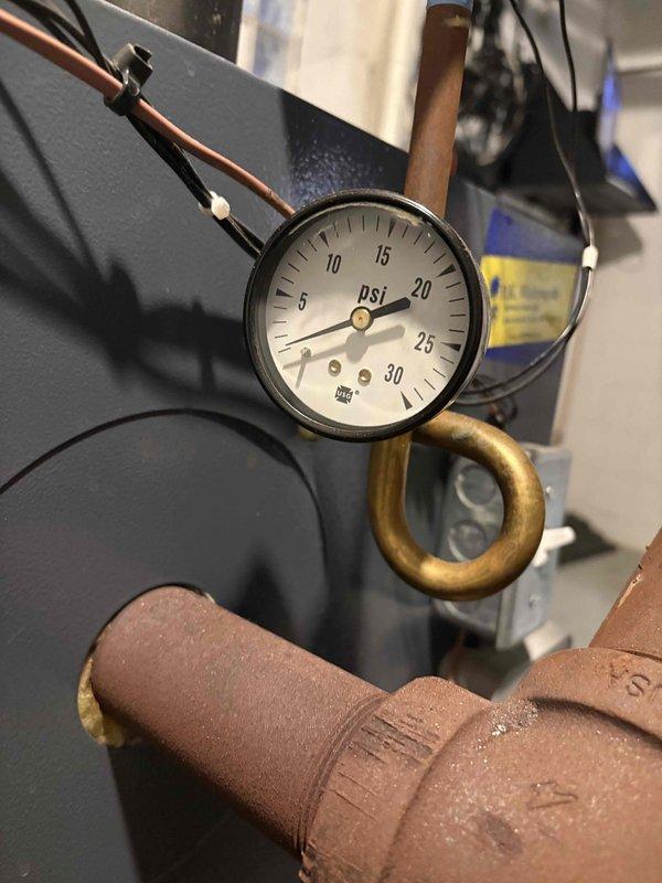Successfully replaced approximately 5 feet of 2-inch steam piping and union above the boiler in the mechanical utility area. Pressure testing confirmed proper system operation with gauge reading at 7-8 PSI, within normal operating parameters.