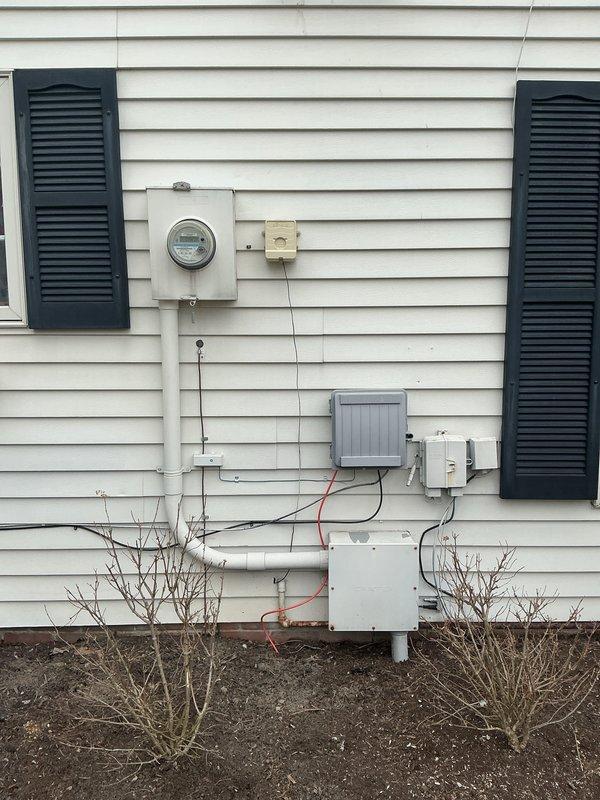Conducted electrical inspection of main service panel with focus on intermittent breaker tripping issues related to previously installed tankless water heater. Visual inspection revealed properly installed circuit breakers and wiring with no signs of damage, overheating, or anomalies that would explain the tripping incidents.