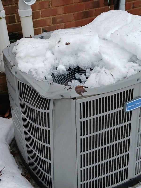 Conducted site assessment for electrical reconnection after customer reported downed wiring between residence and utility pole. Inspected outdoor electrical meter box mounted on brick exterior wall showing deteriorated sealant at conduit connection point, and documented condition of adjacent HVAC equipment with compromised clearance. Provided comprehensive estimate for rewiring and service restoration.