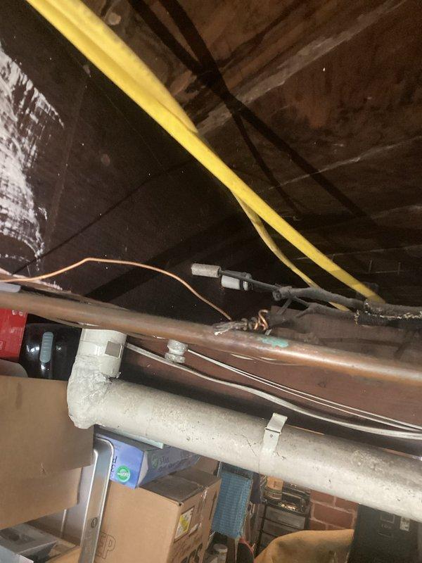 Performed comprehensive electrical inspection on tankless Navien water heater installation after customer reported recurring fuse issues. Identified and corrected improper wiring connections at the unit, inspected ceiling electrical conduit routing, and verified proper grounding. All electrical components now functioning correctly with no further circuit interruptions.