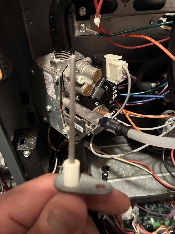 Performed routine heating maintenance service on system. Inspected control board wiring and connections, noting all electronic components in good working order with properly secured wire bundles. Tested gas valve operation with diagnostic probe and verified proper functionality of all electrical connections.