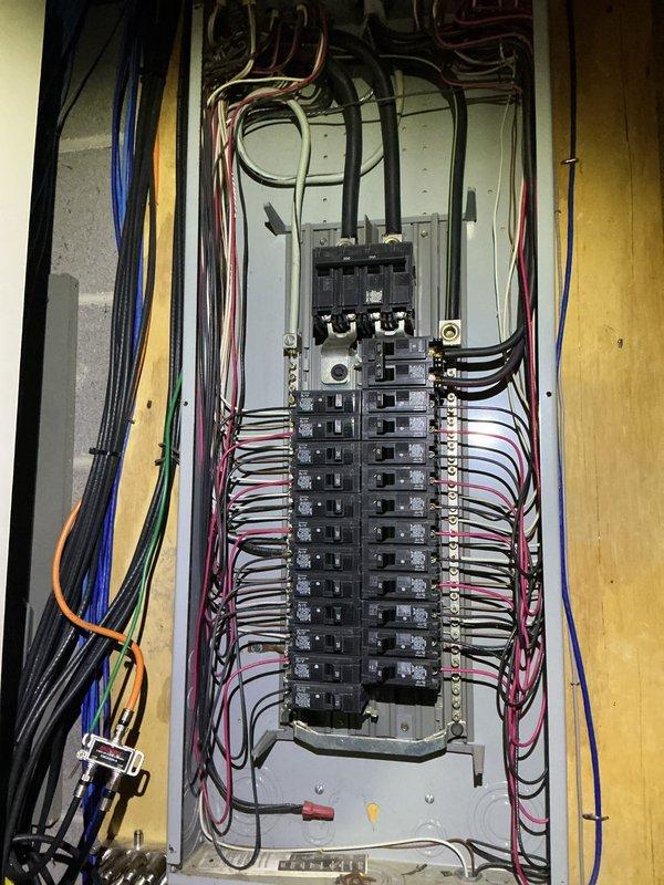 Conducted electrical inspection of residential property, examining both the exterior meter installation and interior breaker panel. Documented proper installation of exterior meter with appropriate conduit connections to the home's electrical system, along with comprehensive evaluation of interior circuit breaker panel wiring and connections to ensure system safety and code compliance.