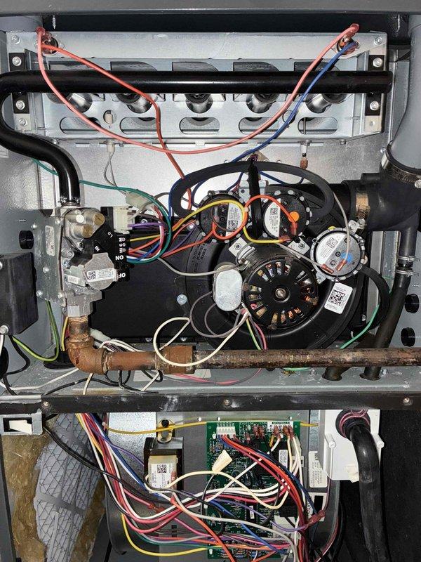 Performed scheduled heating maintenance on furnace system. Inspected and tested all electrical connections, pressure switches, and blower motor assembly for proper operation. Verified wiring integrity throughout control board and component connections, ensuring system is operating within manufacturer specifications.