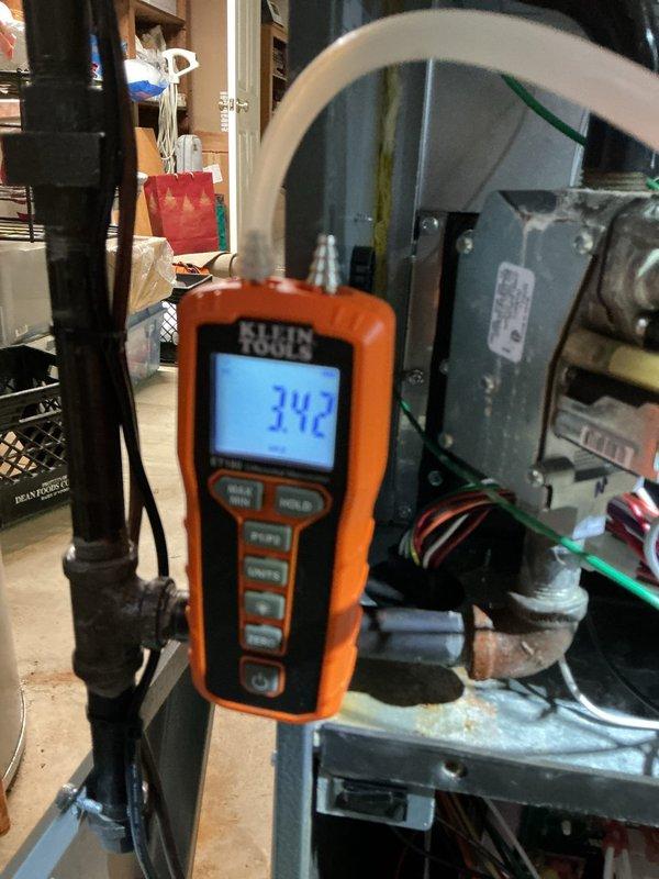 Performed scheduled heating maintenance service on furnace system. Inspected gas valve connections and electrical components for proper operation, finding all connections secure with no signs of significant corrosion. Temperature readings of 34.2°F were recorded during diagnostic testing, confirming system is operating within normal parameters.