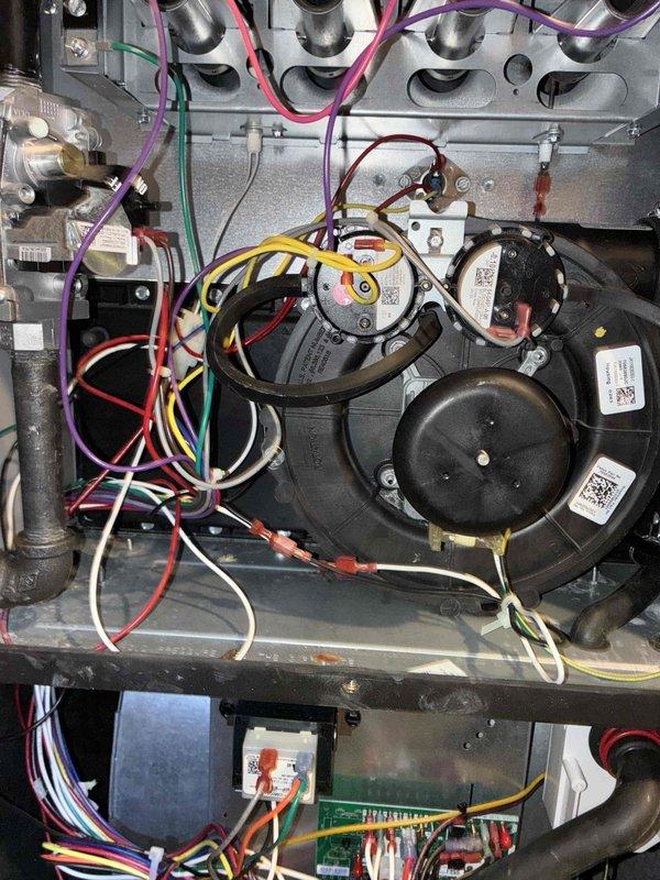 Performed scheduled heating maintenance on furnace system. Conducted comprehensive inspection of blower motor assembly, electrical connections, and control board. Measured system pressure readings (3.54) with UEI EM152 digital meter to verify proper operation within manufacturer specifications.