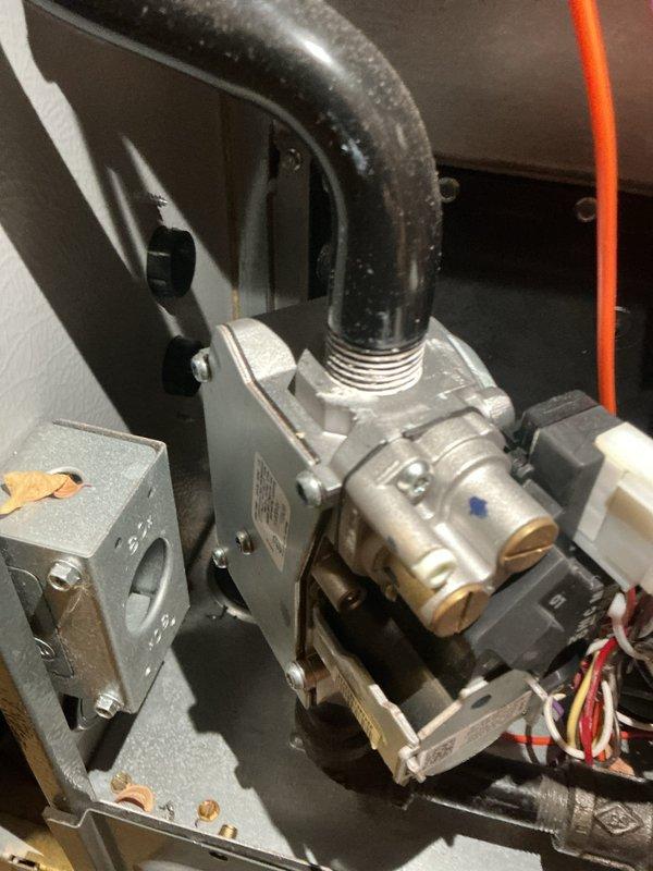 Performed annual heating maintenance on residential boiler system. Inspected gas valve assembly, electrical connections, and control panel components for proper operation. All connections secure with no signs of deterioration; system functioning within normal parameters.
