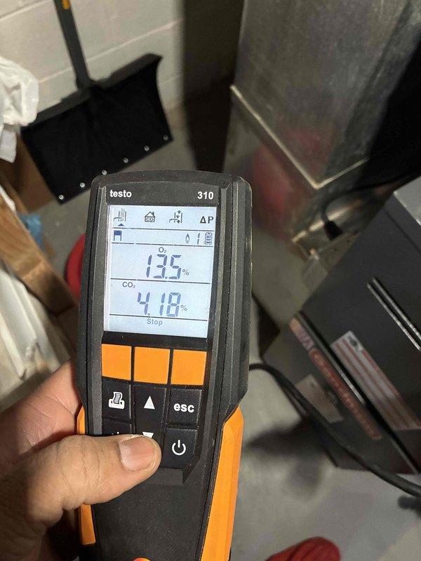 Performed scheduled maintenance on an older Goodman furnace system with Lochinvar water heater. Conducted combustion analysis using Testo 310 analyzer, which revealed elevated CO₂ readings (135%/410%). Inspected all components and connections in the mechanical room, including pressure relief valve, expansion tank, and associated ductwork. System requires adjustment to improve combustion efficiency and reduce carbon dioxide levels.