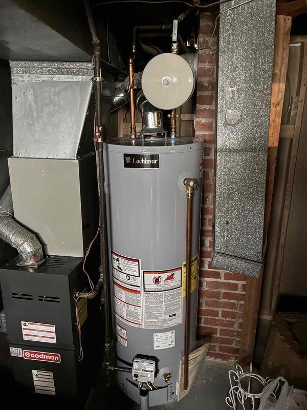 Performed scheduled maintenance on an older Goodman furnace system with Lochinvar water heater. Conducted combustion analysis using Testo 310 analyzer, which revealed elevated CO₂ readings (135%/410%). Inspected all components and connections in the mechanical room, including pressure relief valve, expansion tank, and associated ductwork. System requires adjustment to improve combustion efficiency and reduce carbon dioxide levels.