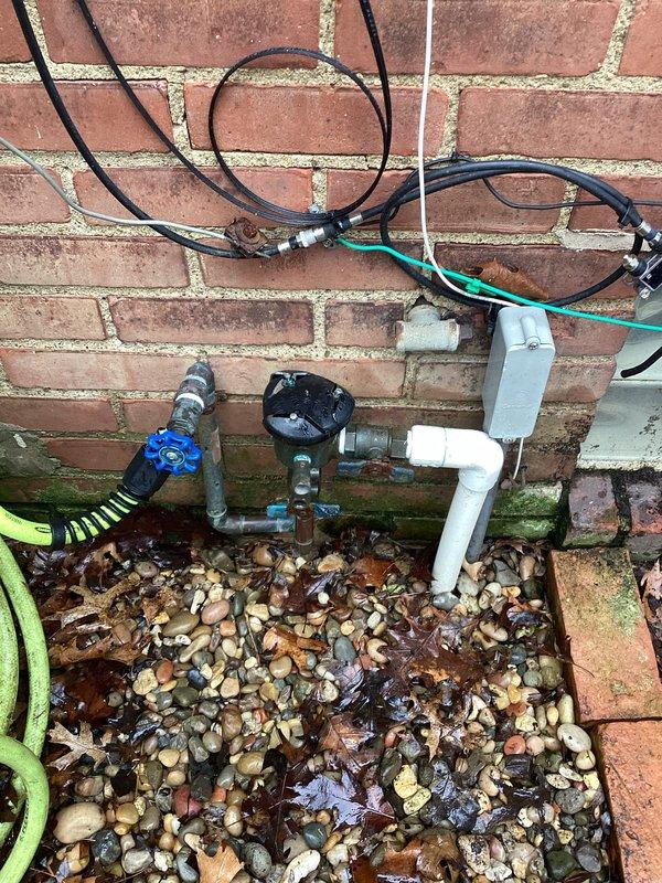 Responded to emergency service call for tanked water heater failure resulting in complete water loss to residence. Inspection revealed compromised water supply connections with visible leakage evident at exterior wall penetrations. Replaced faulty shut-off valves and restored copper supply lines to proper function, successfully restoring water service to the entire home.