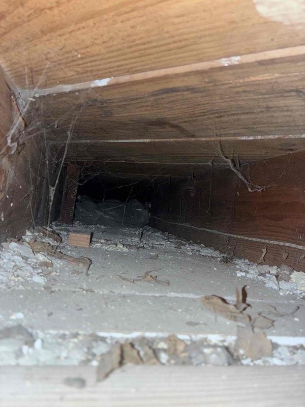 Inspected property to assess feasibility of running new thermostat wiring from furnace to accommodate homeowner's desired WiFi thermostat installation. Examination of the crawlspace revealed significant accessibility challenges due to confined space and structural obstructions. Documented findings with photos and explained to homeowner why wire installation would be impractical given the current configuration.