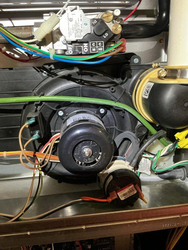 Performed routine heating maintenance on residential HVAC system. Inspected and verified proper wiring connections to blower motor assembly and control module. Checked all components including refrigerant lines, gas connections, and safety controls for proper operation with no issues found.