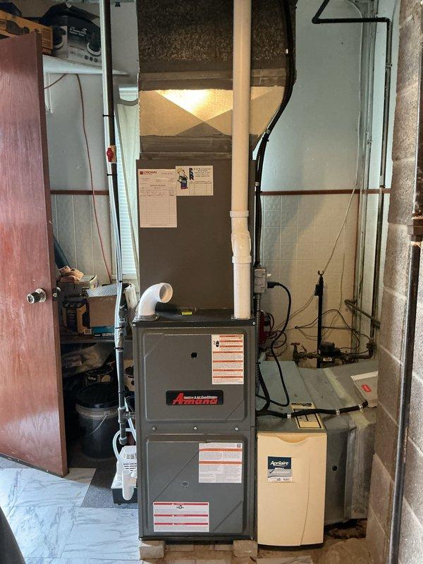 Performed diagnostic inspection of Amana furnace system due to customer concerns about high gas consumption and gas odor detection. Examined ductwork, ventilation components, and gas connections. No active gas leak was found; system was operating within normal parameters. Recommended annual maintenance to ensure continued efficient operation.