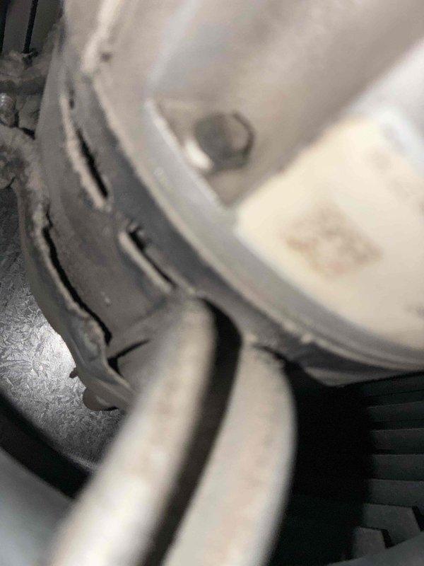 Completed scheduled heating maintenance service on furnace system. Observed water heater with accumulated dust on top and identified deteriorated rubber gasket with visible cracking that requires replacement. System was inspected and serviced according to manufacturer specifications.