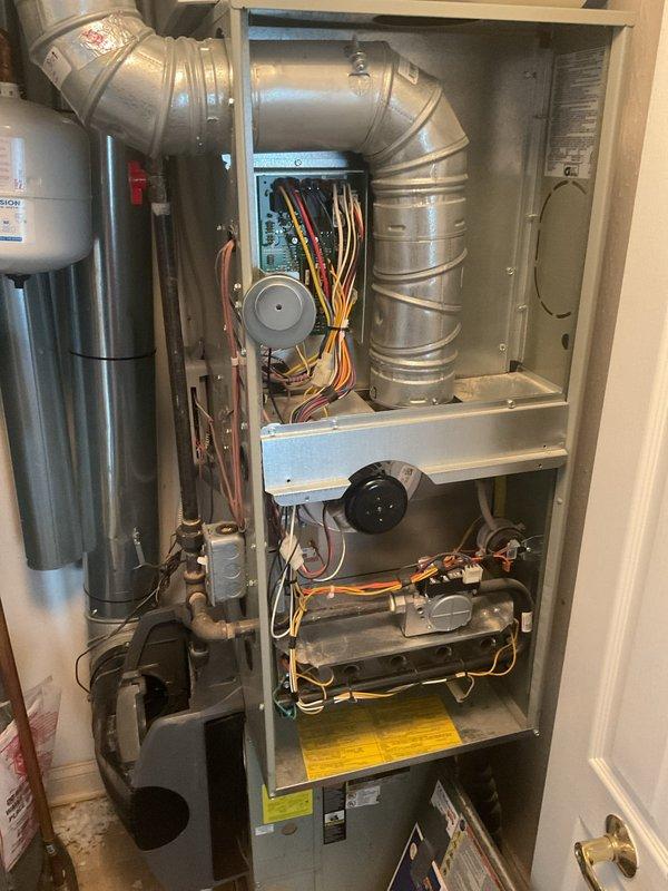 Performed routine heating maintenance on American Standard furnace system. Inspected internal components including circuit board, blower motor, and wiring connections. System operating within normal parameters with no issues detected.
