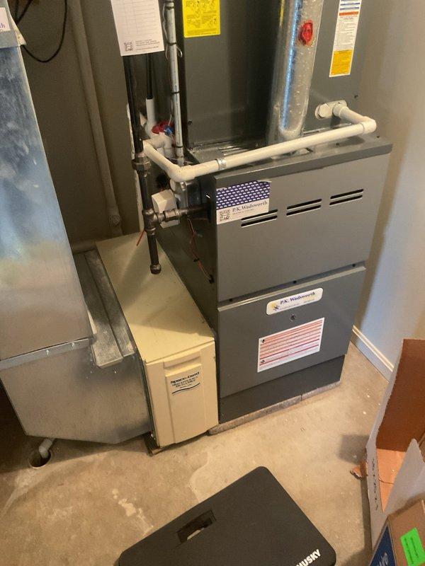 Completed routine heating system tune-up on residential furnace system. Inspected and serviced the main furnace unit, associated PVC ventilation/drainage pipes, and connected ductwork. All components were found to be in proper working order with no issues identified.