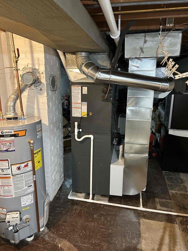 Successfully installed a complete HVAC system including a new 96% efficiency furnace with air conditioning and humidifier. All new ductwork was installed with proper connections to existing infrastructure, and system was fully tested to ensure optimal performance.