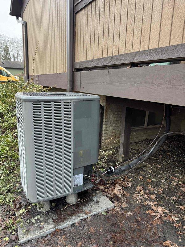 Performed refrigerant recharge service on outdoor condensing unit and conducted comprehensive leak detection. Unit required deep vacuum pull prior to recharging. Successfully restored system operation by activating charge mode through ComfortNet thermostat interface after condensing coil replacement.