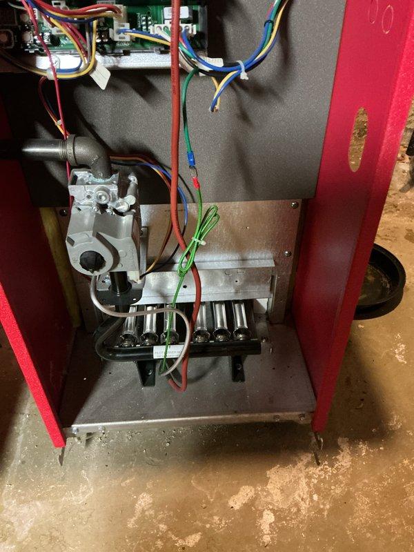 Performed routine boiler maintenance, inspecting control board connections and verifying proper wiring configuration. Examined gas valve assembly and heat exchanger tubes for optimal functionality. Inspected plumbing connections including copper pipes, valves, and fittings for leaks or abnormalities; all components found in good working order.