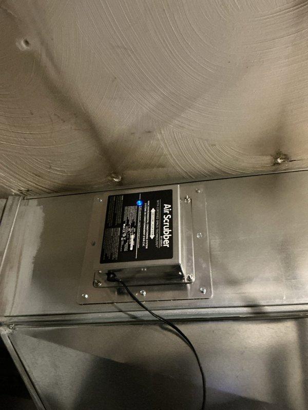 Responded to no heat complaint where thermostat was not communicating with furnace. Observed Air Scrubber device properly installed on ductwork. Restored communication between thermostat and furnace, restoring heating functionality.