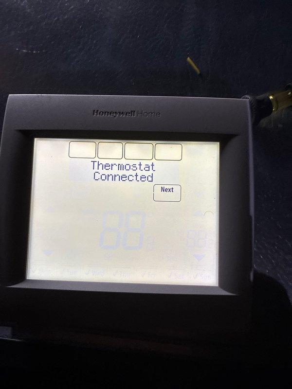 Performed diagnostic testing on thermostat wiring to air handler, using multimeter to verify proper voltage readings (15.6V). Successfully connected and configured Honeywell Home smart thermostat, confirming system communication and functionality.
