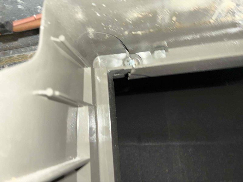 Investigated customer-reported humidifier malfunction that remained unresolved from previous service visit. Inspected Healthy Climate humidifier installation, examining connections and wiring. Found improper mounting at corner joint causing operational failure, corrected installation position and secured fasteners properly to restore humidifier functionality.