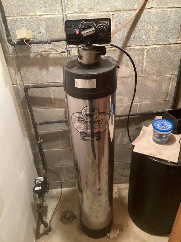 Conducted comprehensive inspection of basement plumbing systems, documenting fully functional sump pump with battery backup installation and Hydro-Quad water filtration system. Provided customer with requested quote for sink replacement options.