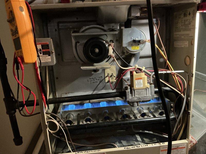 Completed scheduled maintenance on two heating systems. Performed comprehensive inspection of blower motor, flame sensors, and gas valve assemblies. Both units were tested during operation with proper blue flame pattern observed, confirming optimal combustion and system functionality.