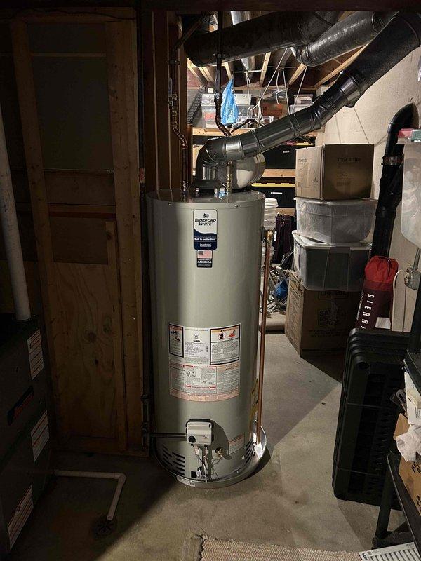 Completed installation of new 96% efficiency furnace with matching air conditioning system and 50-gallon hot water tank. All components were properly wired with control assembly connections verified, and ventilation systems were installed according to manufacturer specifications. System was fully tested and is operating at optimal performance levels.