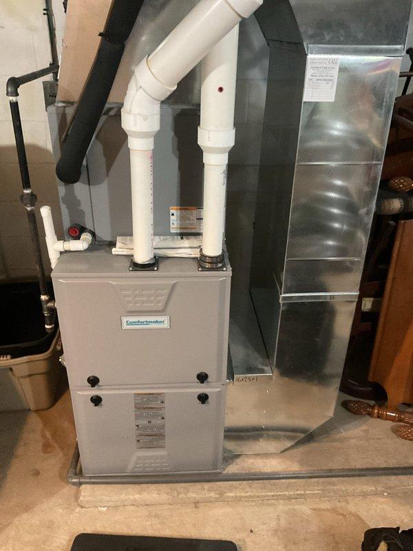 Performed routine heating maintenance on Comfortmaker furnace system. Inspected all components including PVC ventilation pipes, ductwork connections, and electrical junctions. System operating within normal parameters; no issues detected.