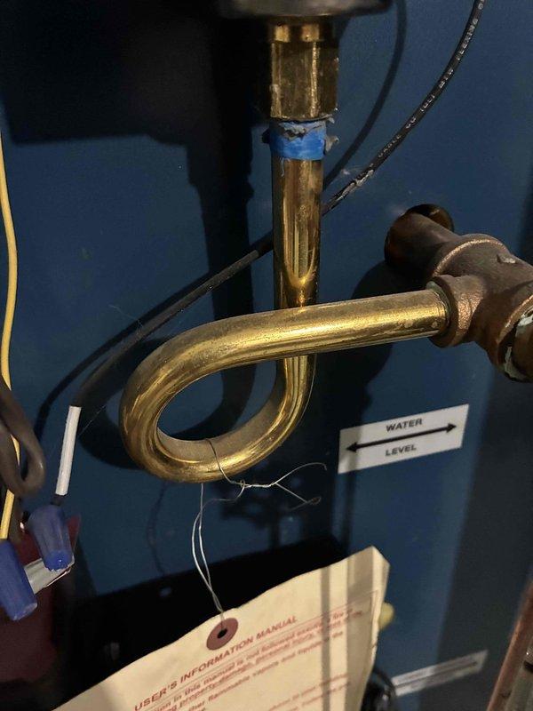 Performed scheduled maintenance on water boiler system. Inspected interior heat exchanger panels and insulation for proper condition. Verified proper water level indicators and checked plumbing connections on circulation loop, confirming all components are functioning within normal parameters.