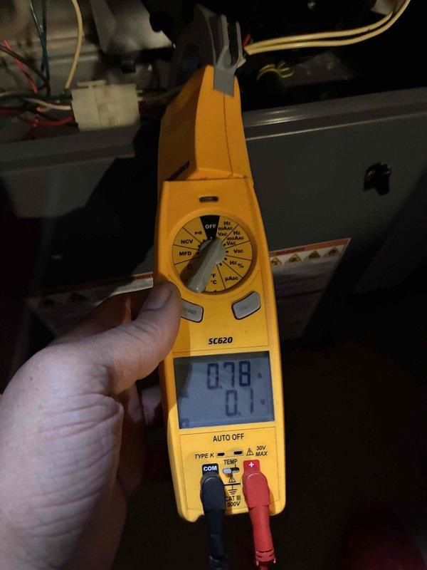 Performed scheduled heating maintenance including electrical testing with clamp meter showing readings of 0.78/0.1. Inspected and evaluated heat exchanger fins, which displayed normal wear pattern with no visible damage. All systems operating within specifications after service completion.