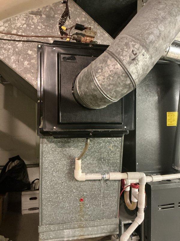 Performed scheduled heating maintenance service on dual-system HVAC installation. Inspected primary furnace unit including ductwork, condensate drainage system, and electrical connections. Accessed and examined control board circuitry, verified proper wire connections and component functionality, and noted normal dust accumulation consistent with regular operation.