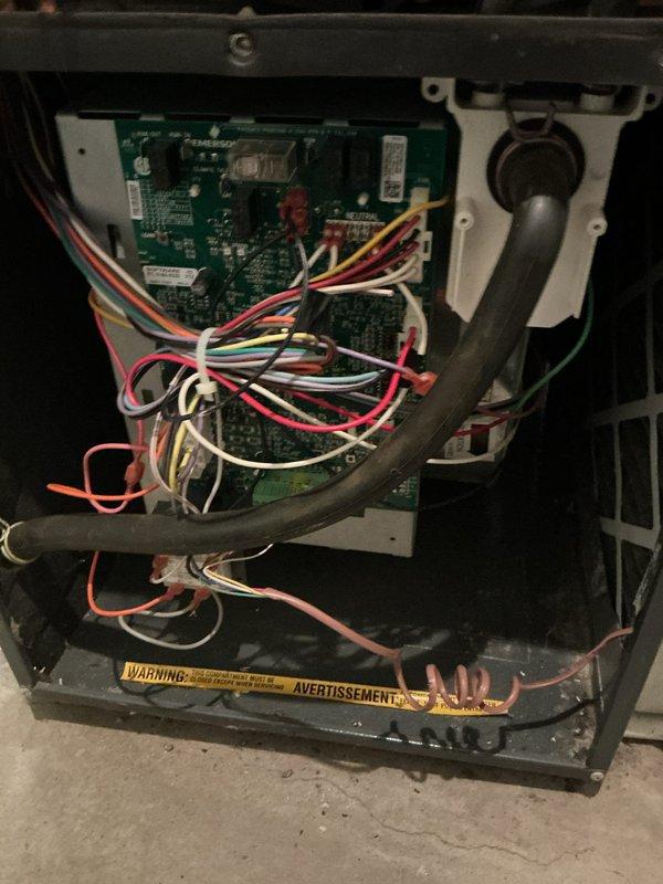 Performed scheduled heating maintenance service on dual-system HVAC installation. Inspected primary furnace unit including ductwork, condensate drainage system, and electrical connections. Accessed and examined control board circuitry, verified proper wire connections and component functionality, and noted normal dust accumulation consistent with regular operation.