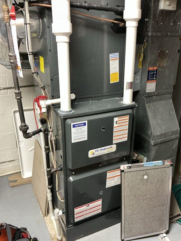 Performed scheduled heating maintenance on dual-system installation. Conducted gas pressure testing with digital manometer, recording static pressure of 3.06. Inspected furnace components, filter condition, and PVC venting system for proper operation and safety compliance.