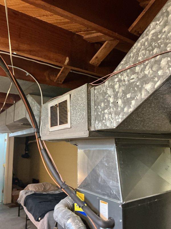 Performed scheduled preventative maintenance on residential furnace system. Inspected ductwork configuration and connections in mechanical area, ensuring proper installation and integrity. Verified operation of supplementary heating unit in sunroom area, confirming all components functioning within normal parameters.
