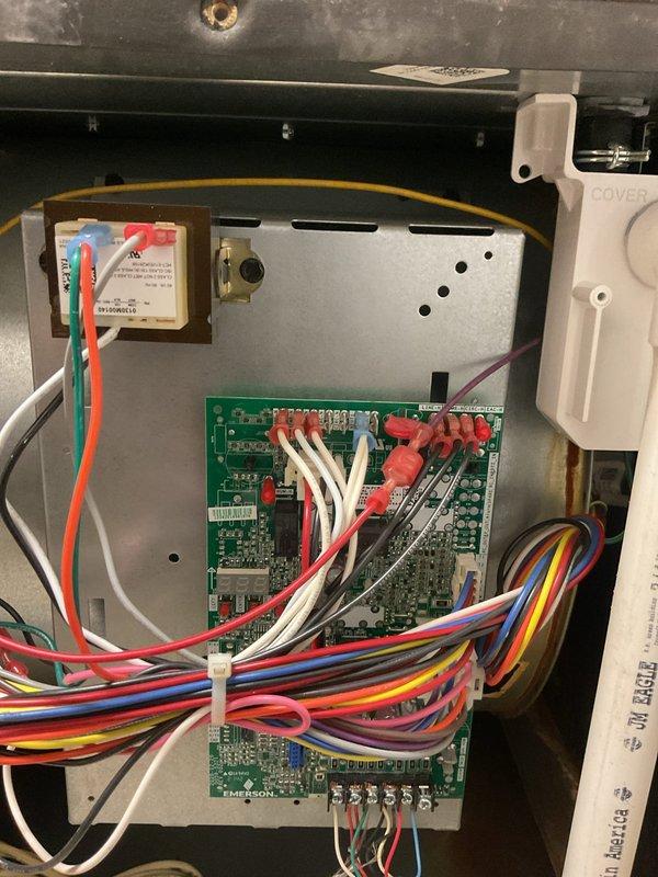 Performed comprehensive heating maintenance on a gas furnace system in an unoccupied property. Inspected control board components, verified proper wire connections, and examined all electrical terminals for secure attachment. System is functioning properly with all safety controls operational.