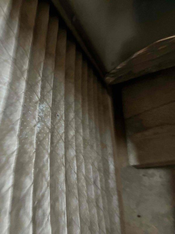 Performed routine maintenance on aging heating system. Conducted combustion analysis using Testo 310 analyzer, recording CO₂ levels at 5.42% and efficiency readings. Inspected insulation in utility area, noting some deterioration and discoloration that should be monitored.