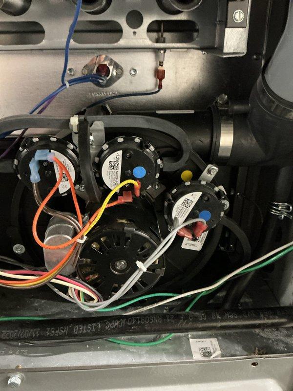 Performed scheduled heating maintenance on residential furnace system. Inspected Aprilaire whole-home humidifier and verified proper connection to ductwork. Checked pressure switches and control modules for proper operation, confirming all electrical connections were secure and functioning correctly.