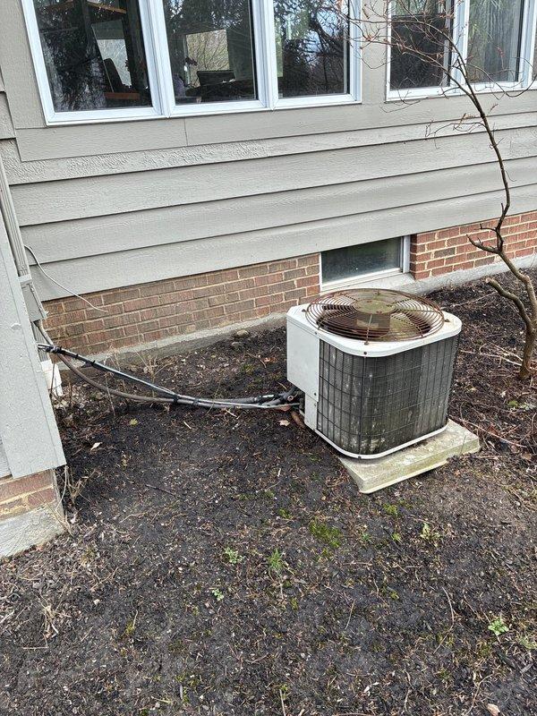 Inspected downstairs furnace system with cracked heat exchanger requiring replacement. Conducted full assessment of existing HVAC equipment including outdoor condenser unit and indoor furnace with attached humidifier. Provided replacement options to address safety concerns from compromised heat exchanger.