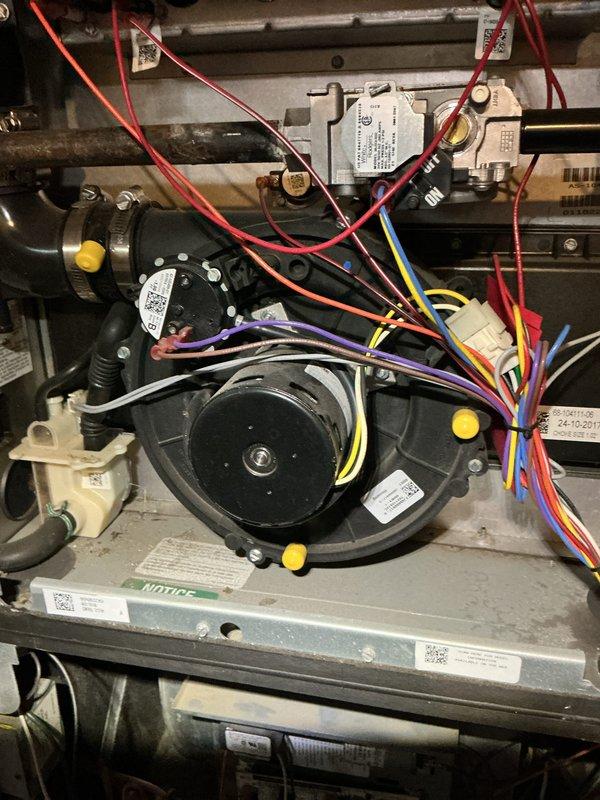 Performed scheduled heating maintenance service on residential furnace. Inspected blower motor assembly, electrical connections, and PVC venting system. All components functioning within normal parameters; no issues identified during the service visit.