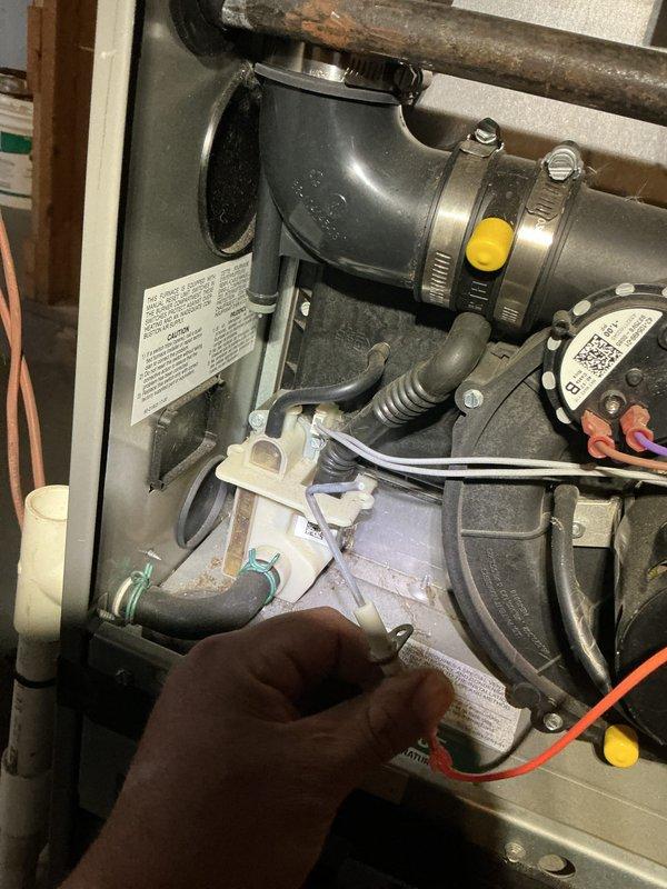 Performed scheduled heating maintenance service on residential furnace. Inspected blower motor assembly, electrical connections, and PVC venting system. All components functioning within normal parameters; no issues identified during the service visit.