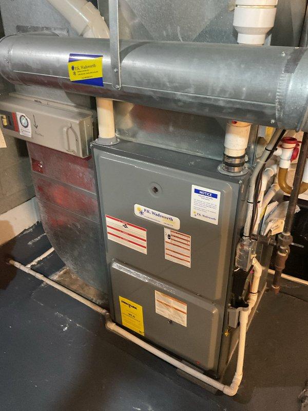 Performed scheduled heating maintenance service on residential gas furnace system. Inspected and tested all internal components including blower motor, electrical connections, and control board. System is functioning properly with no issues identified; all ventilation and condensate lines are properly connected and in good condition.