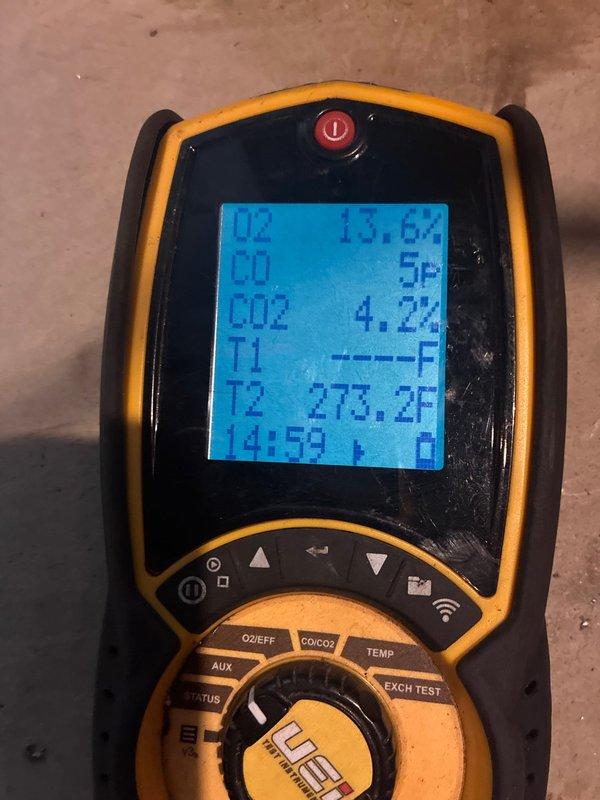 Successfully installed 80% efficiency furnace in utility room with proper ductwork connections and exhaust venting. Completed combustion analysis with readings of O2 at 13.6%, CO at 5ppm, CO2 at 4.2%, and stack temperature of 273.2°F, confirming proper operation within manufacturer specifications.