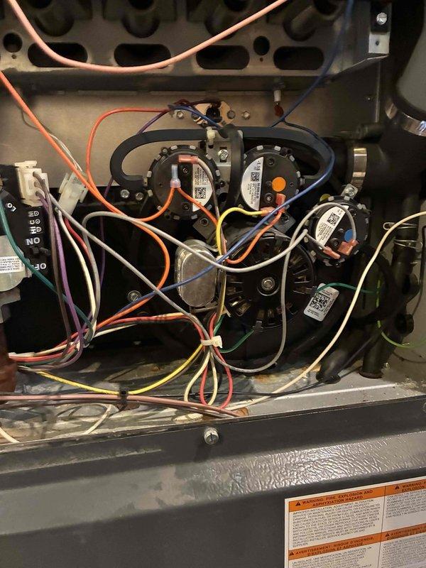 Performed scheduled heating maintenance on residential furnace system. Inspected internal components including control board, wiring connections, and pressure switches, confirming all were in proper working order with no visible damage or wear. Documented system condition with photos for service records.